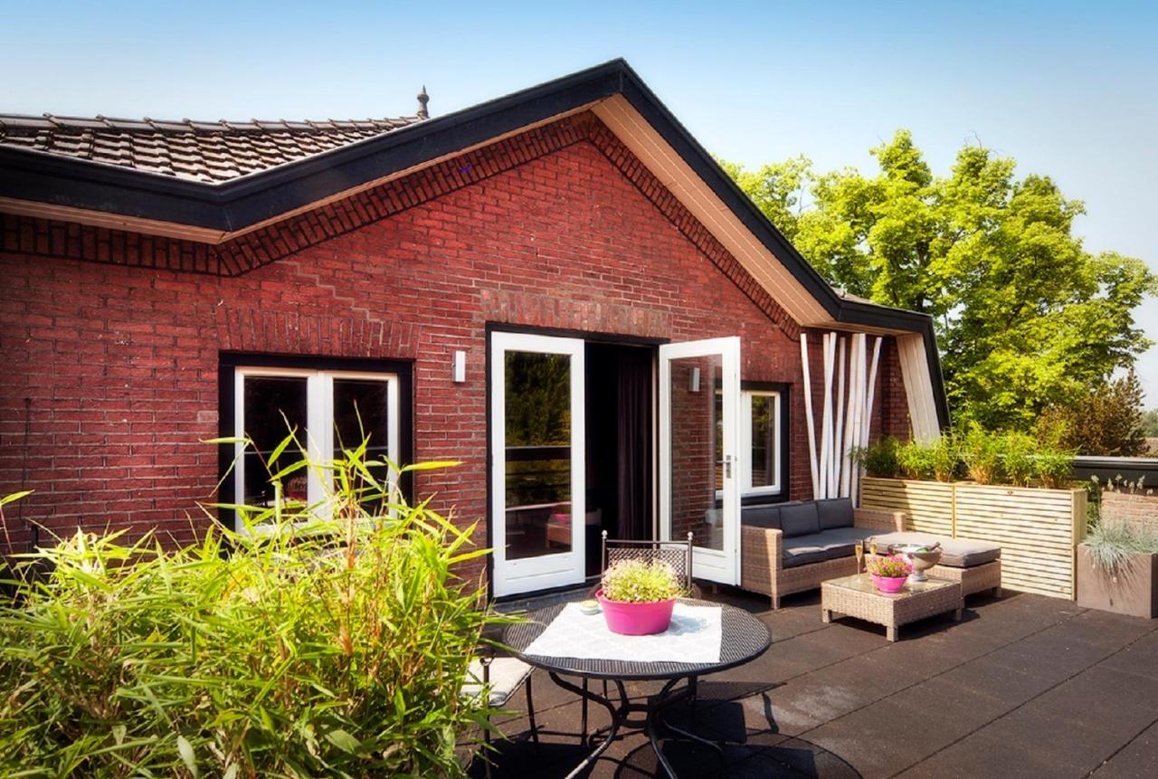Aubergine Logeren & Dineren Tegelen Quarto foto